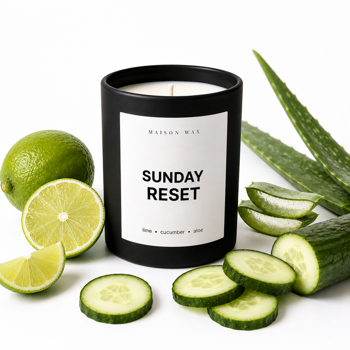 Maison Wax 'Sunday Reset' candle styled with lime, cucumber, and aloe.